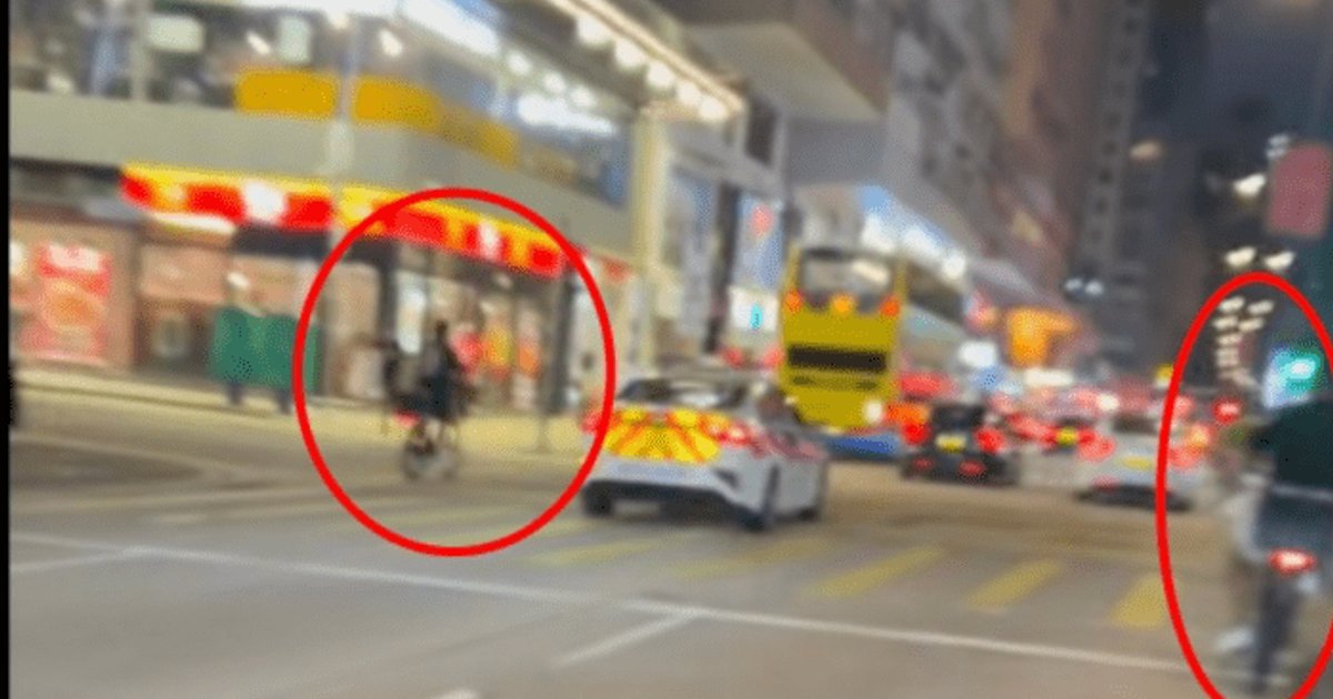 油麻地電動單車「夾擊」警車 網民笑謔:你都交啲戲扮踩下吖大佬