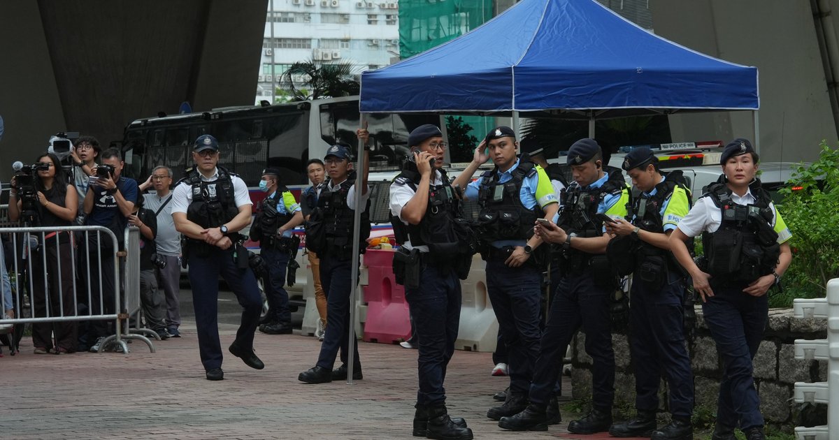 Hong Kong woman held over alleged seditious T-shirt