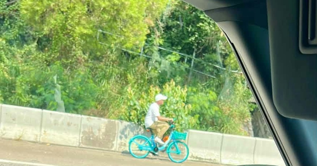 屯門公路兩人踩共享單車遭警截停　網民笑問趕去單車節？