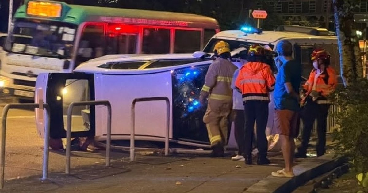 Car overturns on Ma On Shan bend, two hurt