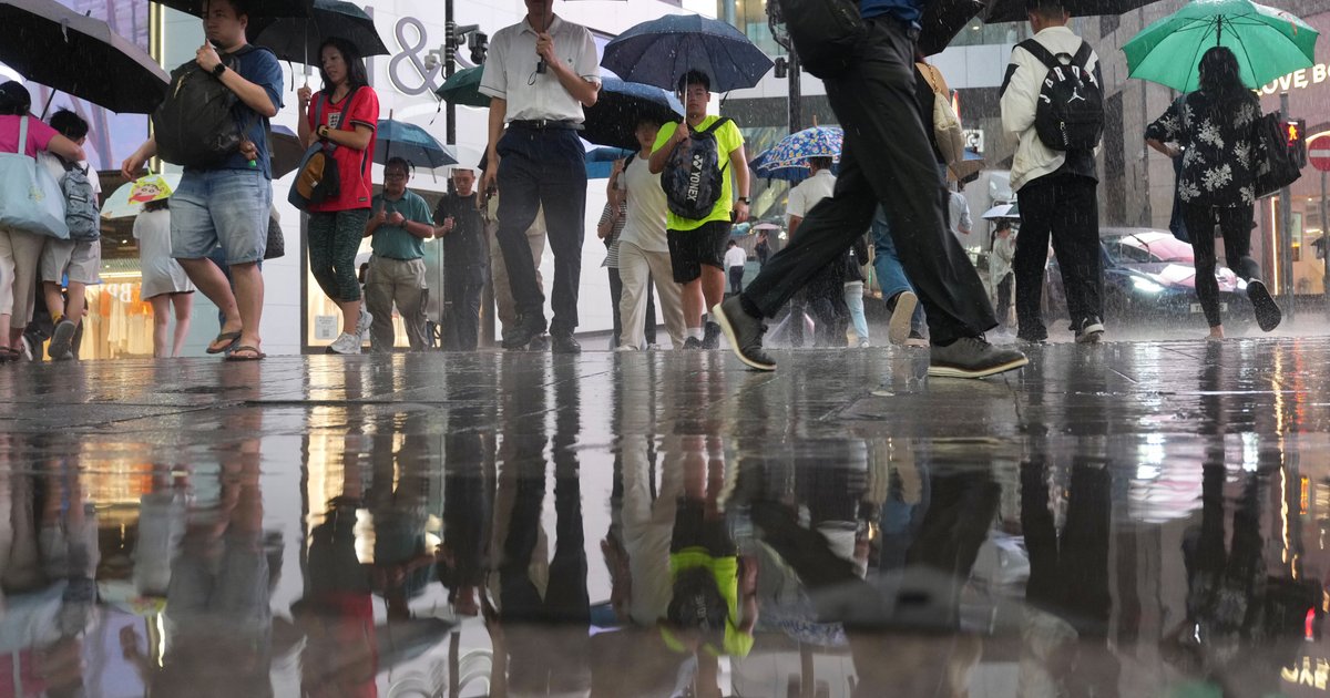 Relief after 9 blistering days as Hong Kong issues amber rainstorm warning