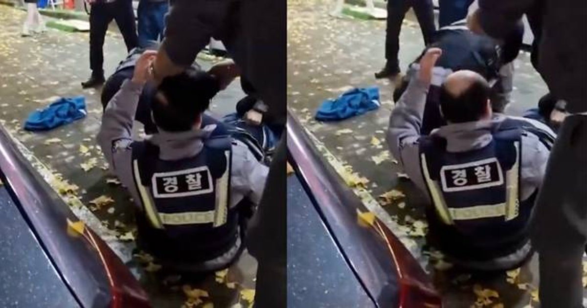 釜山警制服醉汉期间假发脱落 路人默默拾起帮戴回 影片疯传揭为旧片翻炒