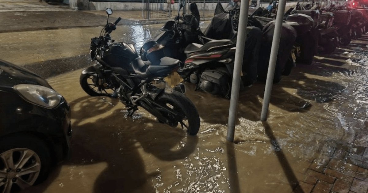 Saltwater Pipe Bursts in Kwai Fong, Motorcycles Surrounded by Muddy Flood