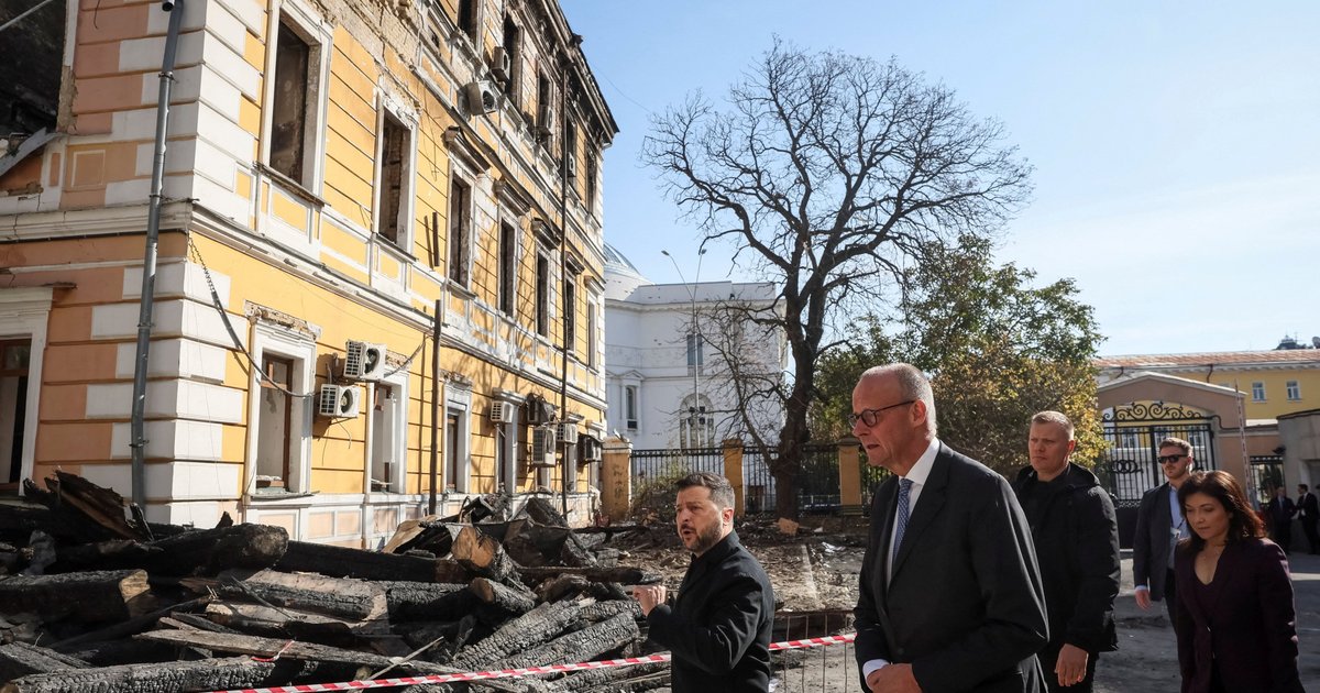 Russia strikes Kyiv bridge as Germany's Merz visits, pledges aid